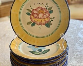 $150 - Set of 8; Ceramic floral plates with yellow rim; made in Italy; hand painted for Gumps; 10” each
