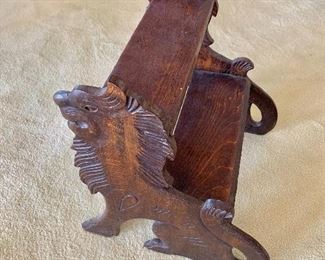 $95 - Vintage wooden stool with carved lions braces
