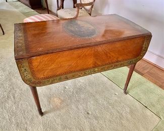 $1,500 - Hand painted Adam double drop-leaf table with one drawer, on caster wheels; 39" W with both leaves up x 28" H