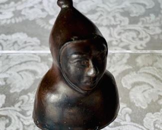 $30 - Metal figural candle snuffer; approx 2” (H)