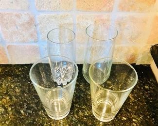 Set of assorted clear drinking glasses