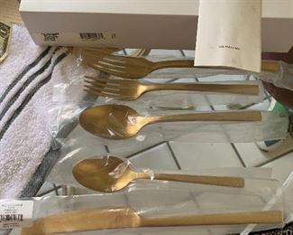 Vera Wang Wedgewood polished gold flatware . New in box
