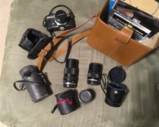 Olympus 35mm camera and lenses.