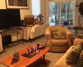 TV  Reclining sofa, leather Lazyboy chair.  Beautiful wooden coffee table and matching end table.