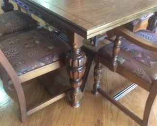 Antique dining table with 6 chairs