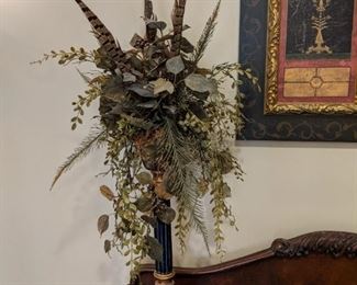 Floral arrangement with pheasant feather detail