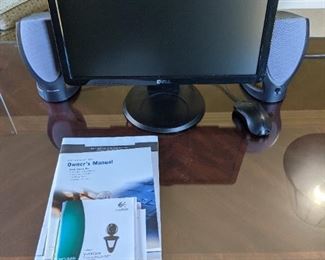Dell Dimension 2350 desktop PC with Logitech QuickCam and Harmon Kardon speakers.