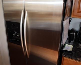 Stainless steel Side by Side refrigerator with water and ice dispenser