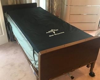 Twin size hospital bed in working order. Medline gel overlay mattress.