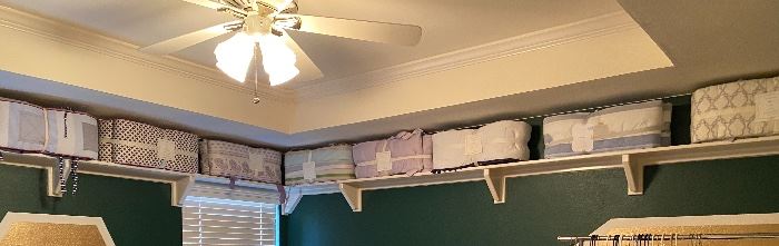 A room full of NEW Pottery Barn Crib Bumpers!