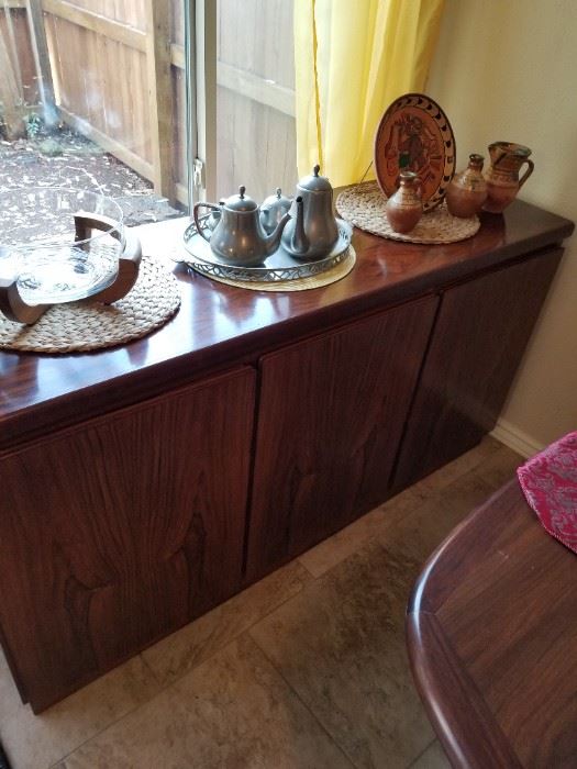 Beautiful buffet goes with oval dining set