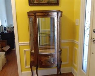 Antique French Cabinet with Bow front glass and wood, hand painted on wood with gold guild trim.. key works to lock
4ft. 7-1/2 in. Tall
1ft. 1-1/2 in. Depth
2ft. 5in. Wide
$350.00