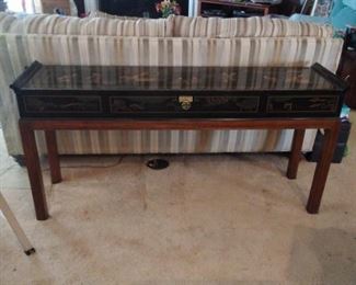 $200.00               Black lacquer Oriental sofa table with glass top