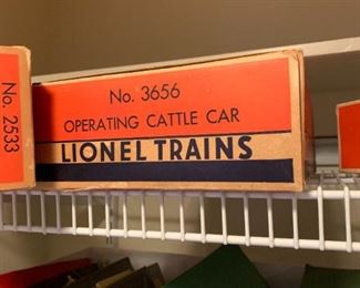 LIONEL TRAIN , MANY PARTS AND MANY PIECES STILL IN ORIGINAL BOXES. TRACKS AND ASSORTED VILLAGE PIECES.  SOLD AS A COMPLETE SYSTEM, NO SEPARATING PIECES.