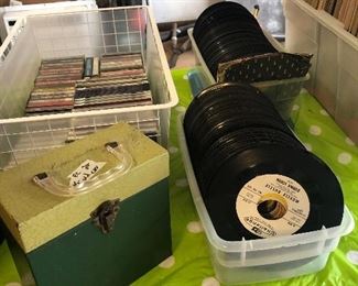 lots of 45 records- cassettes-cd's and vhs- few dvd's too   and 1 vintage 45 case :)) 