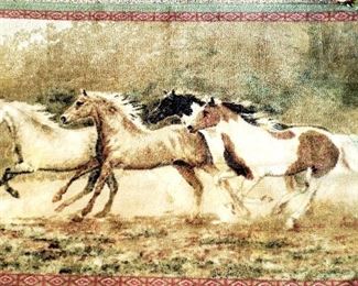 Horse motif rug