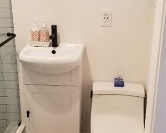 Tiny vanity & toilet perfect for a powder room