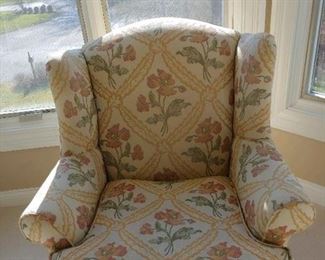 LOT 53 New Price:40.00 Grange Arm Chair. Color soft yellow , with apricot flowers good condition. (note an ink spot on underside of seat cushion,) this has been moved to garage for easy pick up.
