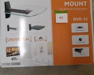 LOT 45 $ 10.00 DVD wall mount shelf