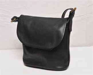 25. Black Leather COACH Handbag