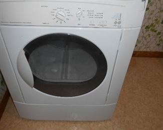 Dryer/ has minor damage to right corner