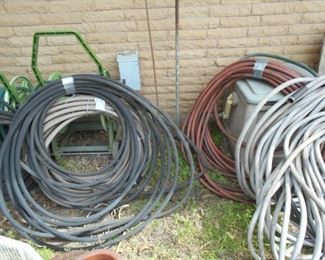 Lots of heavy duty good condition garden hose