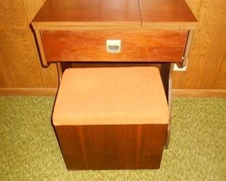 Sewing machine cabinet and storage bench