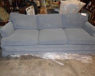 Blue sofa with 2 matching ottoman's