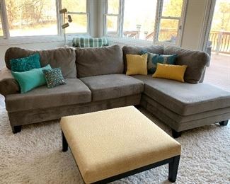 Gray sectional couch 113"L X 40" D  - Large pale yellow upholstered ottoman/coffee table w/2 matching smaller ottomans