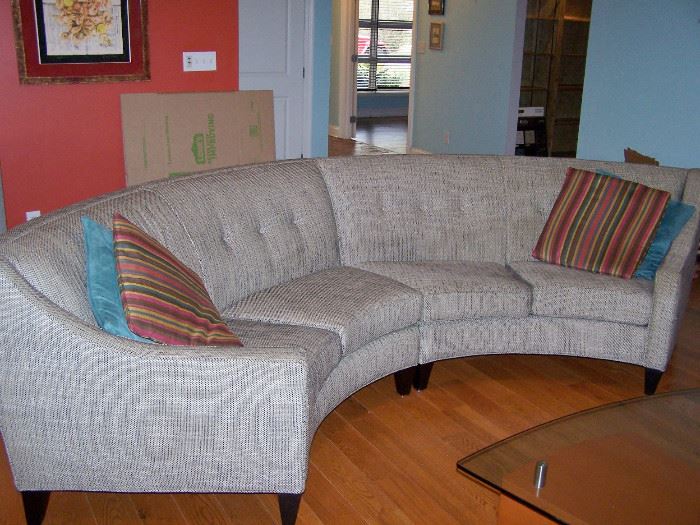 Round Back Sofa, has 2 sections, pillows included.  We have 2 of these sofas!