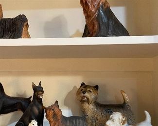 Dog figurines;  porcelain, carved, metal, cast.