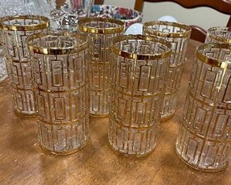 Vintage highboy glasses with gold Greek Key design.