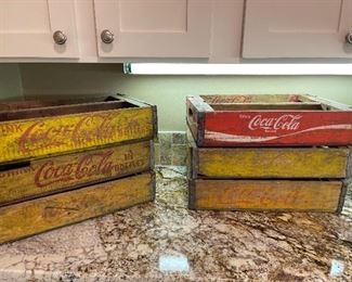 10 vintage Coca Cola crates.