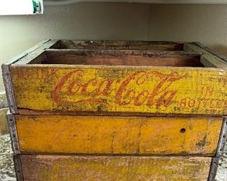10 vintage Coca Cola crates.