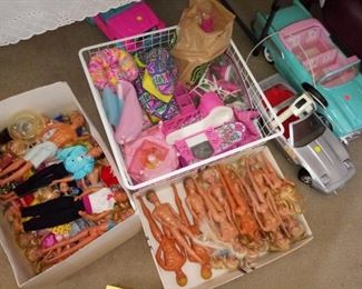 Barbie dolls and vehicles