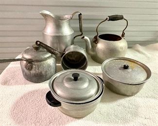 22.	Lot 6 piece vintage cookware (pitcher, teapot, covered saucepans) $26 NOW $13