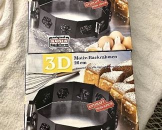 45.	2 3D Motiv Springform pans (new in box)	$10