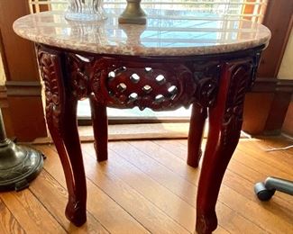 23.	Pair of marble top side table 19”D x 25 ½”L x 23”H  $160