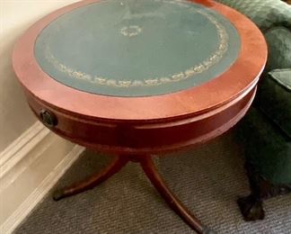 37.	Tambour side table 20”D x 2’H leatherette top $40