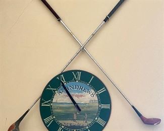 41.	Two antique golf wood clubs & clock		$40 