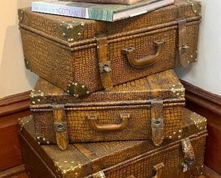 61.	Set of three décor luggage			$50 