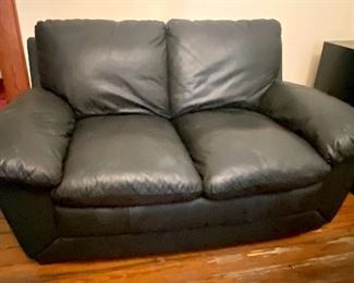 69.	Leather small loveseat 56”L x 34”D 		$220