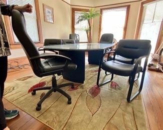 89.	Conference table 93”L x 46”W & 7 seating armchairs 			$450