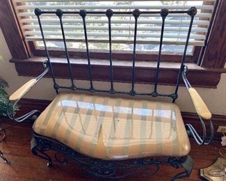 99.	Iron bench 43”W x 44” to the top x 20”D 				$220	