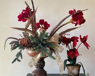 103.	Two floral arrangements 					 $ 40 