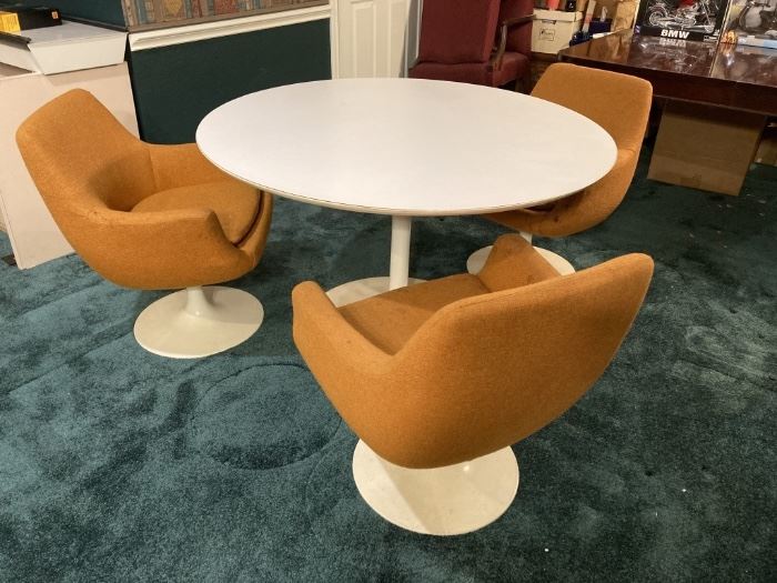 Midcentury Modern Tulip Style Table & 3 Club. Chairs Table measures 48 inches in diameter and is 28 inches tall.