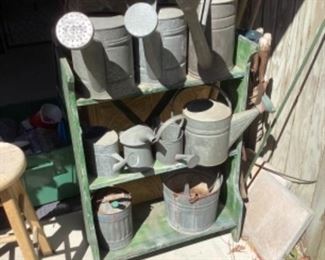 Antique complete galvanized water cans