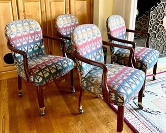 Set of four game chairs on casters. Fabric is a woven flamestitch pattern. Chairs 23" w, 25" d, 36" high, 18" seat height, 19 1/2" inside seat depth. Very comfortable. 