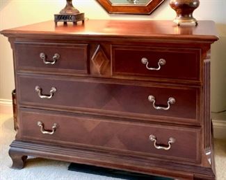 Three drawer chest by Alexander Julian with inlay details & brass hardware. 47" w, 26" d, 33" high. Very good condition.