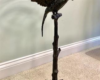 Iron bird table with glass top. 18" diameter, 25 3/4" high. Look at photos for details.